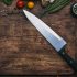 Best chef knife on a cutting board with ingredients