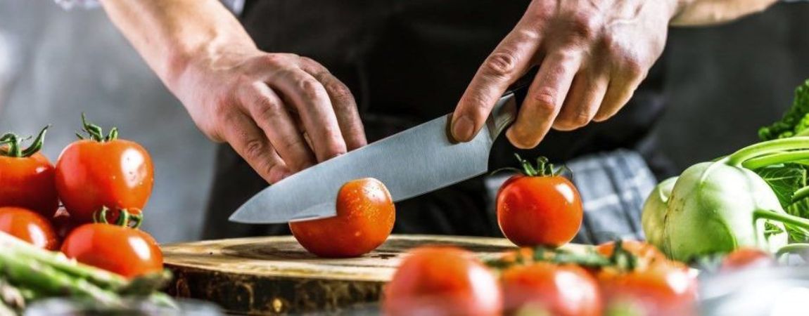 Cutting tomatoes with a chef knife