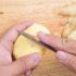 Peeling a potato with a knife