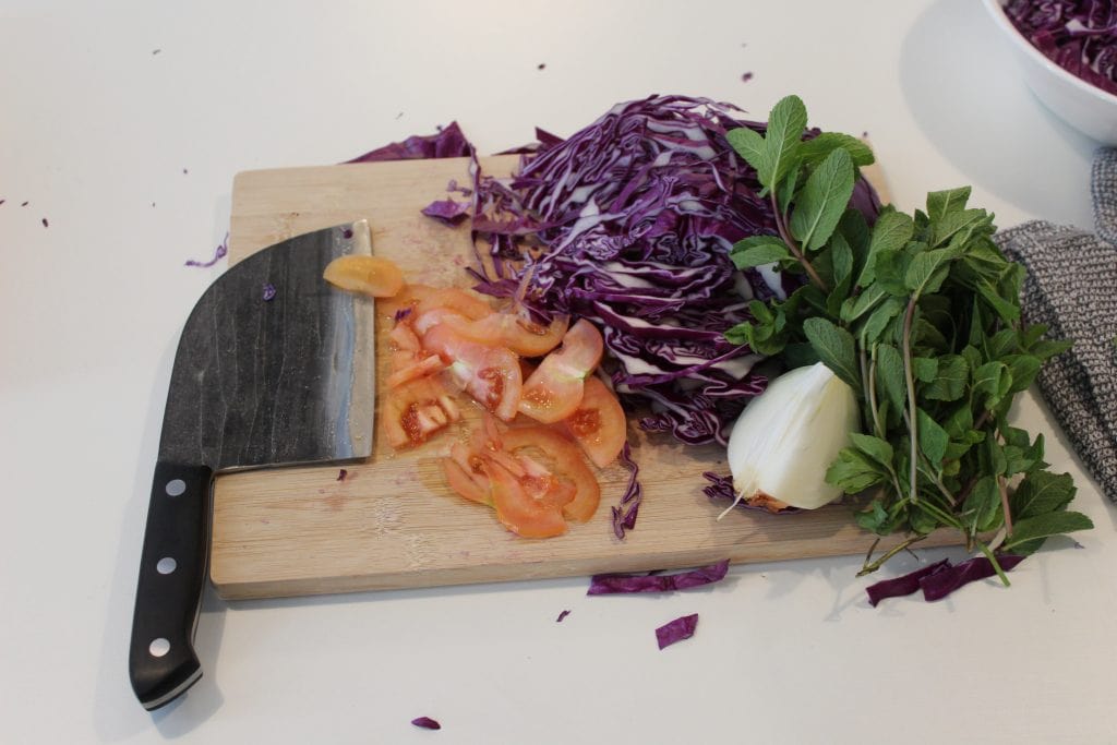 serbian knife on a cutting board