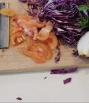 serbian knife on a cutting board