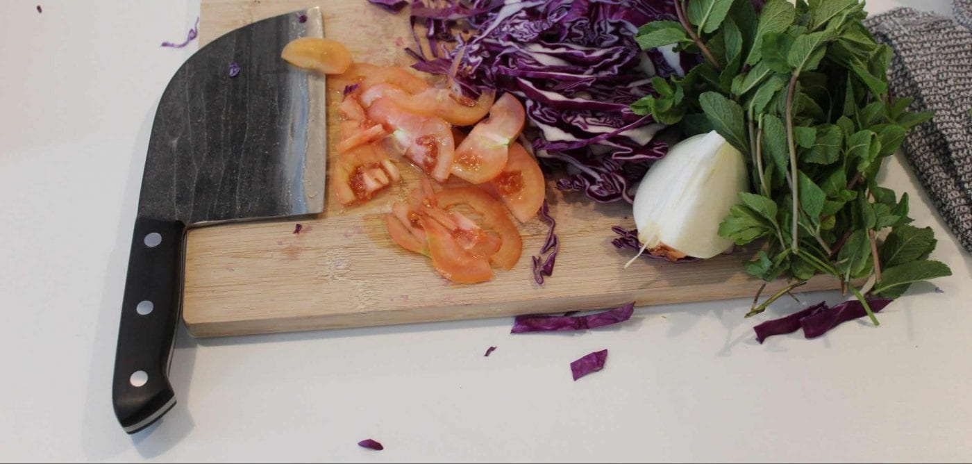 serbian knife on a cutting board