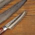 Japanese Professional Kitchen Knives On The Wood Cutting Board