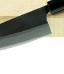 kitchen knife and wood butcher block countertop