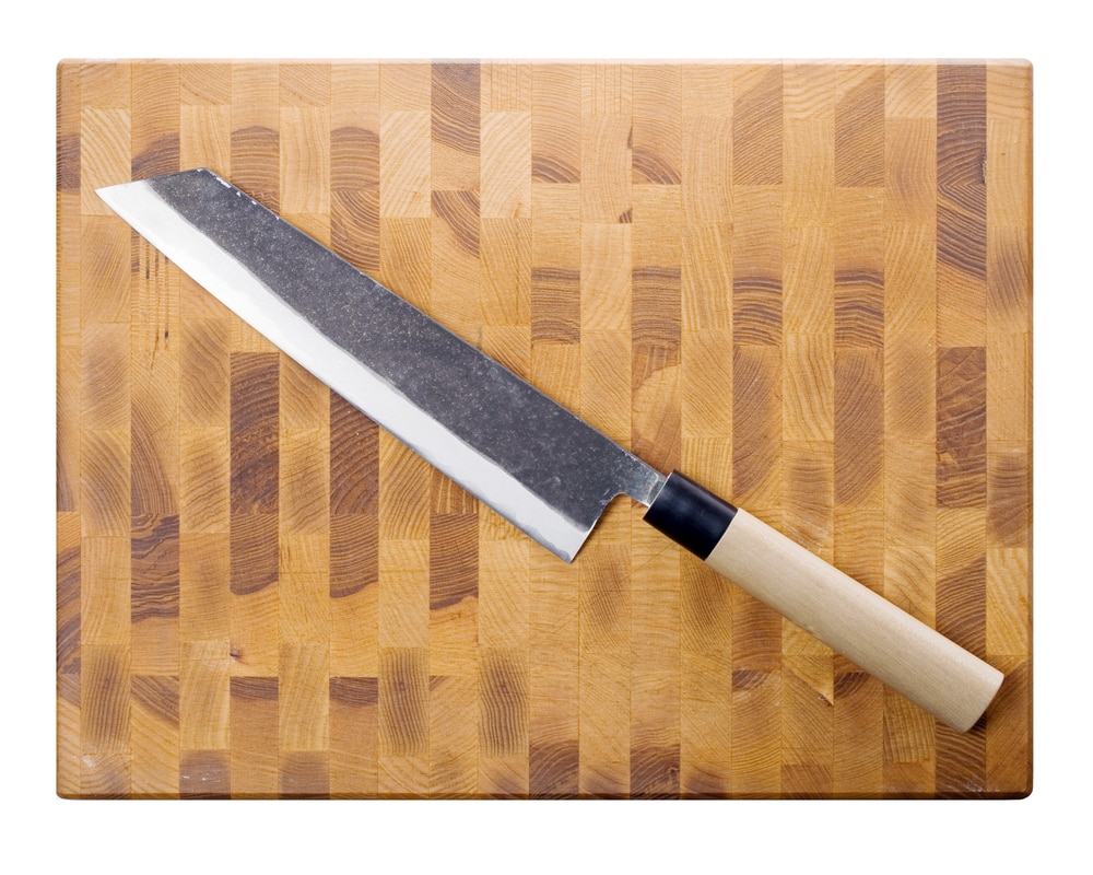 Kiritsuke big knife on board (top view) isolated on