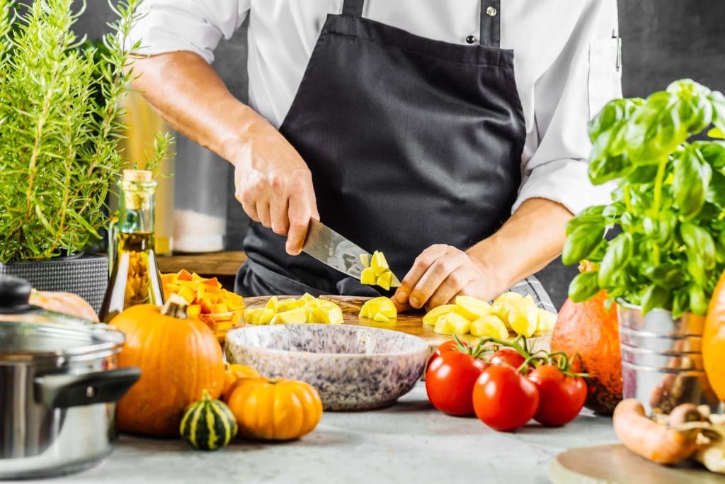 Man cutting vegetables