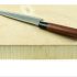 Japanese kitchen deba knife and wood butcher block