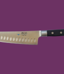 The Mac Professional 8 Inch Hollow Edge Chef Knife, horizontal on a purple background