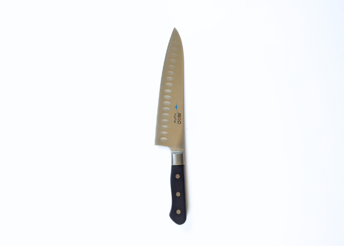 The Mac Professional 8 Inch Hollow Edge Chef Knife, vertical on a white background